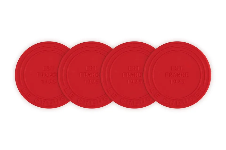 le-creuset-silicone-coasters-est-1925-set-of-4-cerise image 1