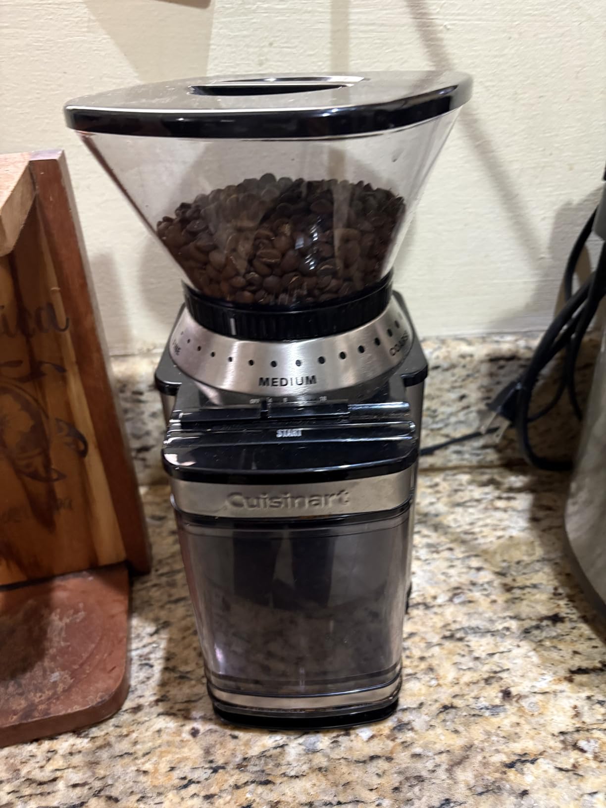 Nice grinder, but static cling